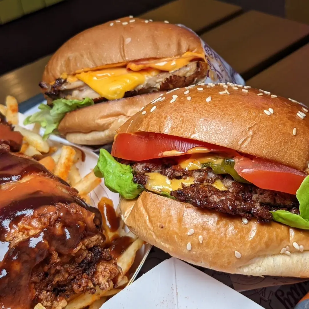 Featured image for Crafting the Perfect Burger: Tips from Sneaky Burger's Kitchen